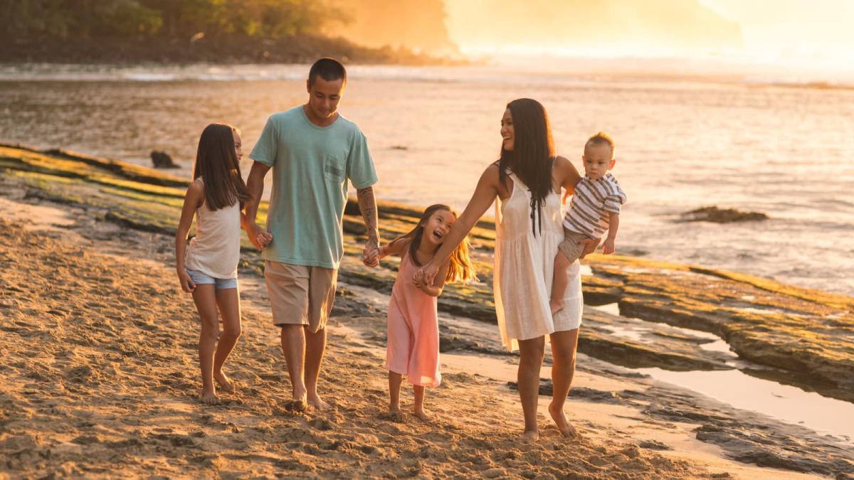 A Costa Rican family on vacation at the beach.